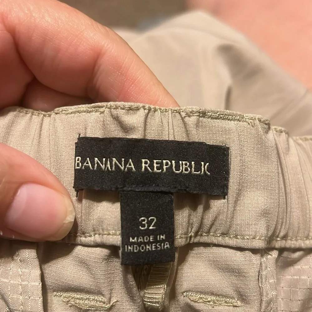 Banana Republic flat front tan shorts. Back elastic waist for comfort.